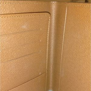 https://dbiyorq10n2b9.cloudfront.net/product-images/ACCLV0054/LOUIS-VUITTON-Monogram-Passport-Cover.jpeg.webp