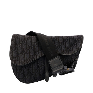 https://dbiyorq10n2b9.cloudfront.net/product-images/BAGCD0029/CHRISTIAN-DIOR-Oblique-Jacquard-Saddle-Bag-Black_1.jpg.webp