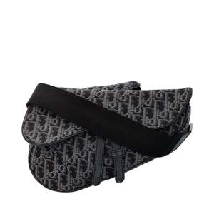 https://dbiyorq10n2b9.cloudfront.net/product-images/BAGCD0042/CHRISTIAN-DIOR-Oblique-Jacquard-Saddle-Bag-Blue_1.jpg.webp