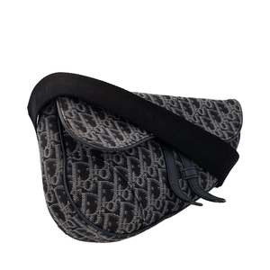 https://dbiyorq10n2b9.cloudfront.net/product-images/BAGCD0042/CHRISTIAN-DIOR-Oblique-Jacquard-Saddle-Bag-Blue_2.jpg.webp