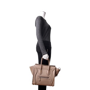 https://dbiyorq10n2b9.cloudfront.net/product-images/BAGCEL0062/CELINE-Leather-Micro-Luggage-Tote-Beige-.jpg.webp