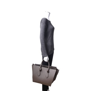 https://dbiyorq10n2b9.cloudfront.net/product-images/BAGCEL0076/CELINE-Leather-Medium-Tie-Knot-Tote-With-Pouch-Olive-Green-.jpg.webp