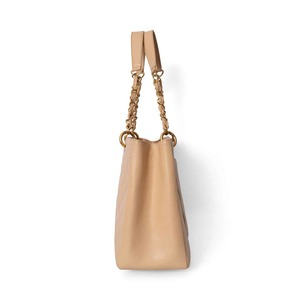 https://dbiyorq10n2b9.cloudfront.net/product-images/BAGCH0142/CHANEL-Quilted-Caviar-Grand-Shopping-Tote-Beige-3.jpg.webp