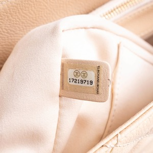 https://dbiyorq10n2b9.cloudfront.net/product-images/BAGCH0142/CHANEL-Quilted-Caviar-Grand-Shopping-Tote-Beige_8.jpg.webp