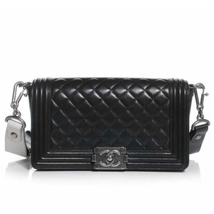 https://dbiyorq10n2b9.cloudfront.net/product-images/BAGCH105/CHANEL-Lambskin-Quilted-Medium-Boy-Flap-w-Stingray-Shoulderstrap-Black-front.jpg.webp