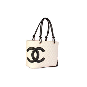 https://dbiyorq10n2b9.cloudfront.net/product-images/BAGCH116/CHANEL-Quilted-Leather-Ligne-Cambon-Large-Tote-White-angle.jpg.webp