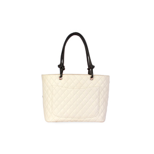 https://dbiyorq10n2b9.cloudfront.net/product-images/BAGCH116/CHANEL-Quilted-Leather-Ligne-Cambon-Large-Tote-White-back.jpg.webp