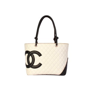 https://dbiyorq10n2b9.cloudfront.net/product-images/BAGCH116/CHANEL-Quilted-Leather-Ligne-Cambon-Large-Tote-White-front-1.jpg.webp