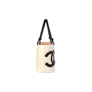 https://dbiyorq10n2b9.cloudfront.net/product-images/BAGCH116/CHANEL-Quilted-Leather-Ligne-Cambon-Large-Tote-White-side-2.jpg.webp