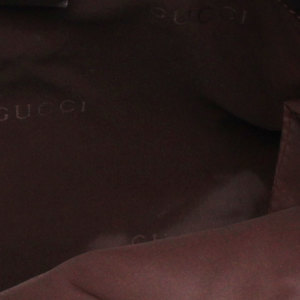 https://dbiyorq10n2b9.cloudfront.net/product-images/BAGGUC0220/GUCCI-GG-Drawstring-Backpack-Ebony.jpg.webp