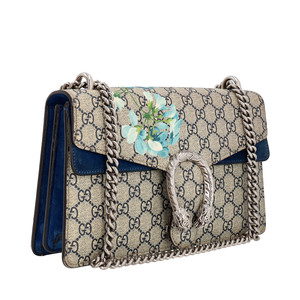 https://dbiyorq10n2b9.cloudfront.net/product-images/BAGGUC0345/GUCCI-GG-Supreme-Bloom-Dionysus-Small-Shoulder-Bag-Blue_2.jpg.webp