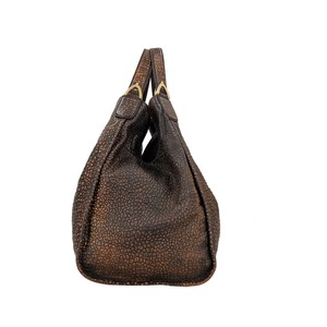 https://dbiyorq10n2b9.cloudfront.net/product-images/BAGGUC0728/GUCCI-Grained-Leather-Large-Stirrup-Shoulder-Bag-Brown_3.jpg.webp
