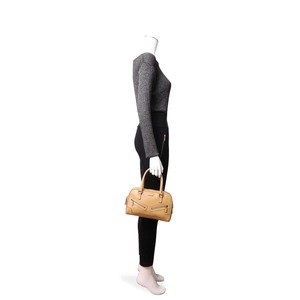 https://dbiyorq10n2b9.cloudfront.net/product-images/BAGGUC0799/GUCCI-Vintage-Leather-Bowler-Bag-Caramel.jpg.webp
