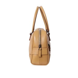https://dbiyorq10n2b9.cloudfront.net/product-images/BAGGUC0799/GUCCI-Vintage-Leather-Bowler-Bag-Caramel_3.jpg.webp