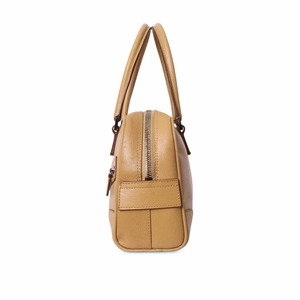 https://dbiyorq10n2b9.cloudfront.net/product-images/BAGGUC0799/GUCCI-Vintage-Leather-Bowler-Bag-Caramel_5.jpg.webp