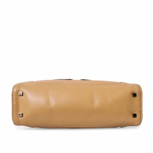 https://dbiyorq10n2b9.cloudfront.net/product-images/BAGGUC0799/GUCCI-Vintage-Leather-Bowler-Bag-Caramel_6.jpg.webp