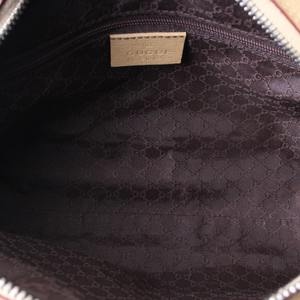 https://dbiyorq10n2b9.cloudfront.net/product-images/BAGGUC0799/GUCCI-Vintage-Leather-Bowler-Bag-Caramel_7.jpg.webp