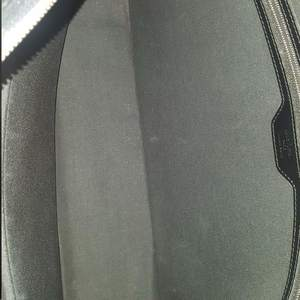 https://dbiyorq10n2b9.cloudfront.net/product-images/BAGLV0036/LOUIS-VUITTON-Damier-Graphite-Porte-Documents-Voyage-GM-interior.jpg.webp