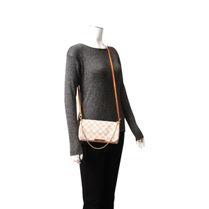 https://dbiyorq10n2b9.cloudfront.net/product-images/BAGLV0985/LOUIS-VUITTON-Damier-Azur-Favorite-PM-1.jpg.webp
