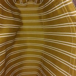https://dbiyorq10n2b9.cloudfront.net/product-images/BAGLV569/LOUIS-VUITTON-Toile-Canvas-Antigua-Cabas-PM-Brown-Limited-Edition-interior.jpg.webp