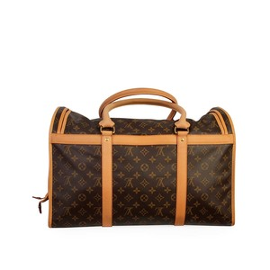 https://dbiyorq10n2b9.cloudfront.net/product-images/BAGLV841/LOUIS-VUITTON-Monogram-Dog-Carrier-50-back.jpg.webp