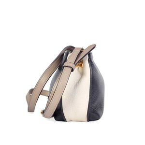 https://dbiyorq10n2b9.cloudfront.net/product-images/BAGMJ105/MARC-BY-MARC-JACOBS-Classic-Q-Percy-Block-Mini-Crossbody-Bag-Side-2.jpg.webp