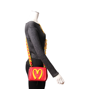 https://dbiyorq10n2b9.cloudfront.net/product-images/BAGMOS0004/MOSCHINO-Leather-Mcdonalds-Crossbody-RedYellow-..jpg.webp
