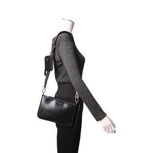 https://dbiyorq10n2b9.cloudfront.net/product-images/BAGPRA0166/PRADA-Leather-Crossbody-Bag-Black.jpg.webp