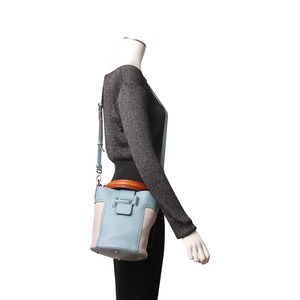 https://dbiyorq10n2b9.cloudfront.net/product-images/BAGTOD0019/TODS-Leather-Double-T-Bucket-Bag-Blue-Grey.jpg.webp