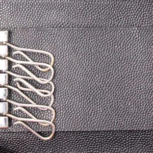 https://dbiyorq10n2b9.cloudfront.net/product-images/CACCCART0005/CARTIER-Leather-Santos-De-Cartier-Key-Holder-Black.jpg.webp