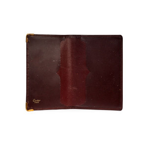 https://dbiyorq10n2b9.cloudfront.net/product-images/CACCCART102/CARTIER-Passport-Holder-Burgundy-open-1.jpg.webp