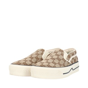 https://dbiyorq10n2b9.cloudfront.net/product-images/CACCGUC0195/GUCCI-GG-Tennis-1977-Slip-On-Sneakers-Beige_1.jpg.webp