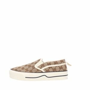 https://dbiyorq10n2b9.cloudfront.net/product-images/CACCGUC0195/GUCCI-GG-Tennis-1977-Slip-On-Sneakers-Beige_3.jpg.webp