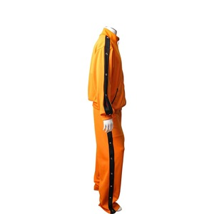 https://dbiyorq10n2b9.cloudfront.net/product-images/CAPPCEL0015/CELINE-Polyester-Studded-Tracksuit-Orange_2.jpg.webp