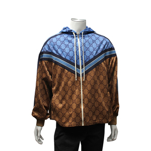 https://dbiyorq10n2b9.cloudfront.net/product-images/CAPPGUC0005/GUCCI-GG-Technical-Jersey-Jacket-BlueCaramel-1.jpg.webp