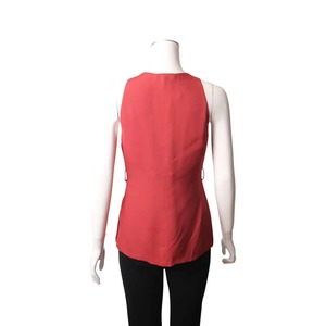 https://dbiyorq10n2b9.cloudfront.net/product-images/CAPPGUC0211/GUCCI-Silk-V-Neck-Sleeveless-Blouse-Dark-Orange_4.jpg.webp