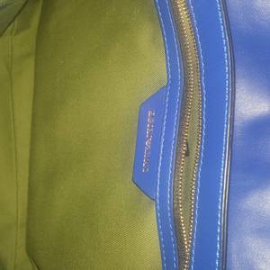 https://dbiyorq10n2b9.cloudfront.net/product-images/CBAGARM0005/EMPORIO-ARMANI-Leather-Shoulder-Bag-Blue-interior.jpg.webp