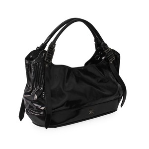 https://dbiyorq10n2b9.cloudfront.net/product-images/CBAGBUR0020/BURBERRY-Patent-Leather-Hobo-Dark-Purple-angle.jpg.webp