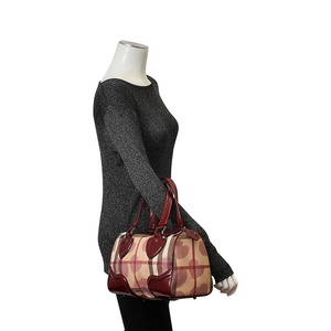 https://dbiyorq10n2b9.cloudfront.net/product-images/CBAGBUR0060/BURBERRY-Patent-Heart-Print-Boston-Bag-Pink-mannequin.jpg.webp