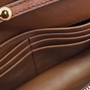 https://dbiyorq10n2b9.cloudfront.net/product-images/CBAGBUR0154/BURBERRY-Leather-Check-Hampshire-Wallet-On-Chain-Brown-1.jpg.webp