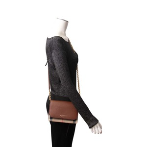 https://dbiyorq10n2b9.cloudfront.net/product-images/CBAGBUR0154/BURBERRY-Leather-Check-Hampshire-Wallet-On-Chain-Brown.jpg.webp