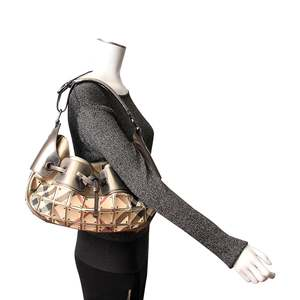 https://dbiyorq10n2b9.cloudfront.net/product-images/CBAGBUR0159/BURBERRY-Supernova-Patent-Studded-Warrior-Bag-Beige-1.jpg.webp