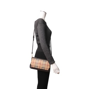 https://dbiyorq10n2b9.cloudfront.net/product-images/CBAGBUR0246/BURBERRY-Haymarket-Check-Peyton-Crossbody-Bag-Beige-Brown.jpg.webp