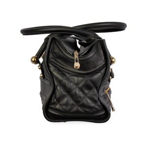https://dbiyorq10n2b9.cloudfront.net/product-images/CBAGBUR185/BURBERRY-Quilted-Leather-Large-Manor-Tote-Black-side-2.jpg.webp