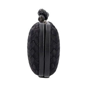 https://dbiyorq10n2b9.cloudfront.net/product-images/CBAGBV0020/BOTTEGA-VENETTA-Satin-Intrecciato-Knot-Clutch-Black_4.jpg.webp