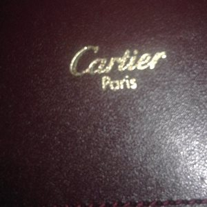 https://dbiyorq10n2b9.cloudfront.net/product-images/CBAGCART104/CARTIER-Leather-Briefcase-Burgundy-close-up.jpg.webp