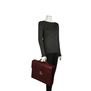 https://dbiyorq10n2b9.cloudfront.net/product-images/CBAGCART104/CARTIER-Leather-Briefcase-Burgundy-mannequin.jpg.webp