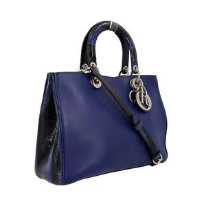 https://dbiyorq10n2b9.cloudfront.net/product-images/CBAGCD0041/CHRISTIAN-DIOR-Leather-Python-Diorissimo-Tote-Blue_2.jpg.webp