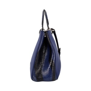 https://dbiyorq10n2b9.cloudfront.net/product-images/CBAGCD0041/CHRISTIAN-DIOR-Leather-Python-Diorissimo-Tote-Blue_3.jpg.webp