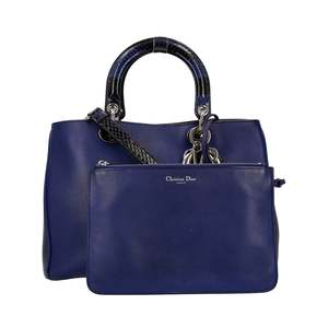 https://dbiyorq10n2b9.cloudfront.net/product-images/CBAGCD0041/CHRISTIAN-DIOR-Leather-Python-Diorissimo-Tote-Blue_7.jpg.webp